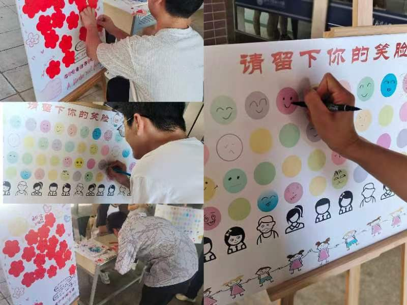（图为第一社区“留下你的笑脸”活动剪影）.png
