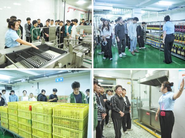 工作人员带领学生参观食堂餐饮加工区域.jpg 工作人员带领学生参观食堂餐饮加工区域.jpg